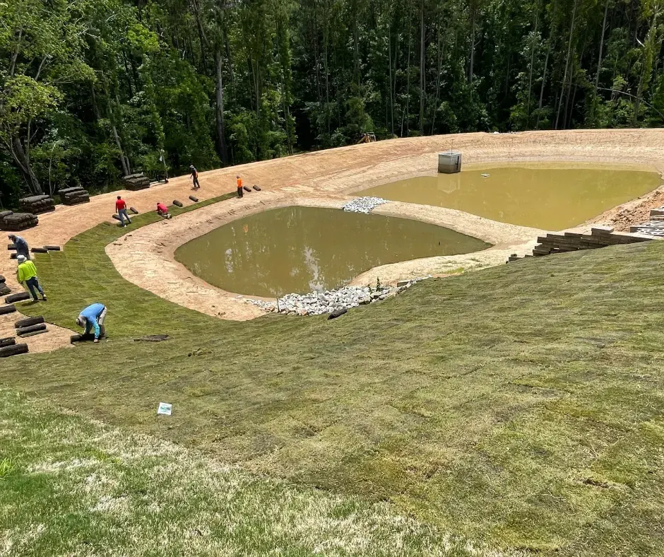 Team stabilizing a converted pond in a North Carolina development