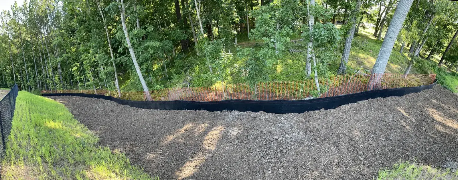 Silt fence and site protection on a wooded North Carolina construction site