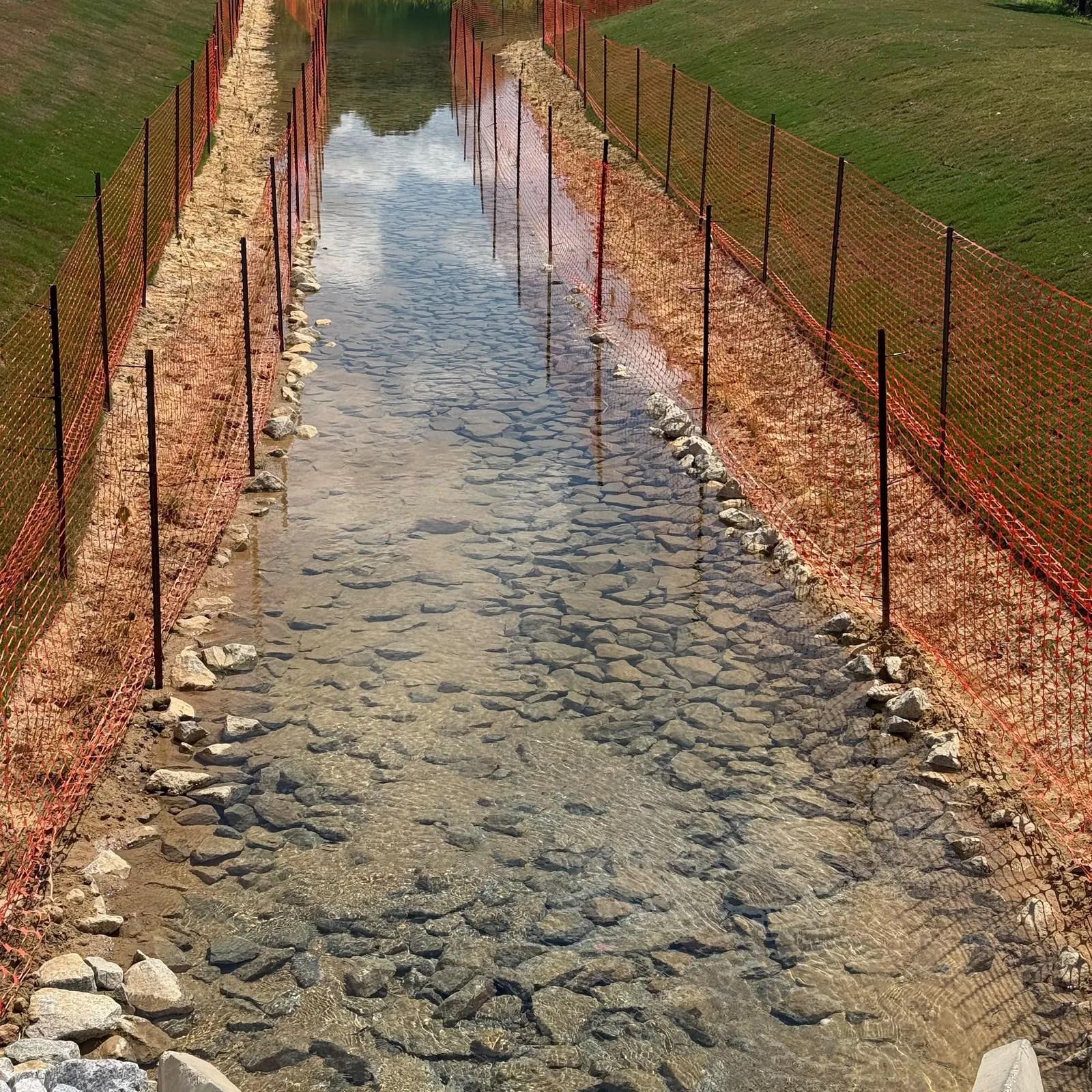 Stormwater channel near a townhome community, Parc Townes at Wendell